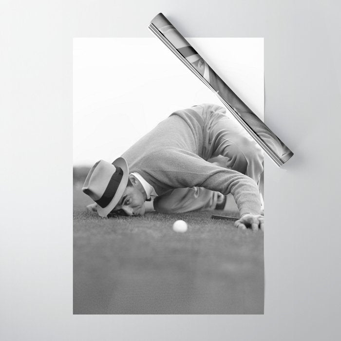 Eye to the ground on the 18th hole; golfing man eyes ball to measure distance to hole vintage black and white portrait photograph - photography - photographs poster Wrapping Paper Gallery Image 1