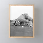 Eye to the ground on the 18th hole; golfing man eyes ball to measure distance to hole vintage black and white portrait photograph - photography - photographs poster Mini Art Print Gallery Image 1