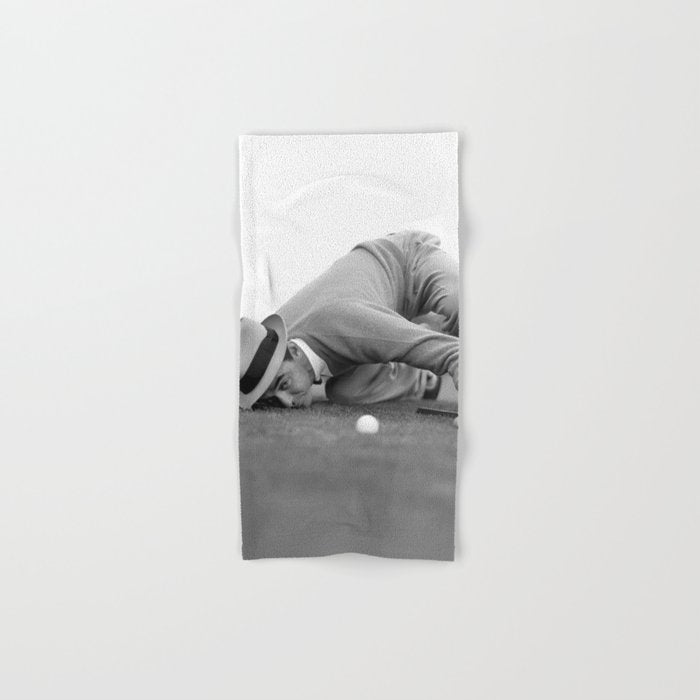Eye to the ground on the 18th hole; golfing man eyes ball to measure distance to hole vintage black and white portrait photograph - photography - photographs poster Bath Towel Gallery Image 1