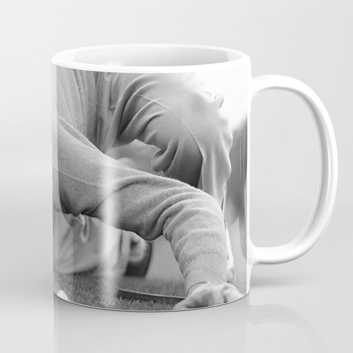 Eye to the ground on the 18th hole; golfing man eyes ball to measure distance to hole vintage black and white portrait photograph - photography - photographs poster Coffee Mug Gallery Image 1