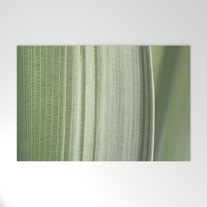 Botanical green abstract tropical leaf art print - mindful nature and travel photography Welcome Mat Gallery Image 1