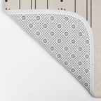 Daisy Stripes Minimalist Geometric Flowers and Stripes Pattern in Black and Almond Cream Bath Mat Gallery Image 2
