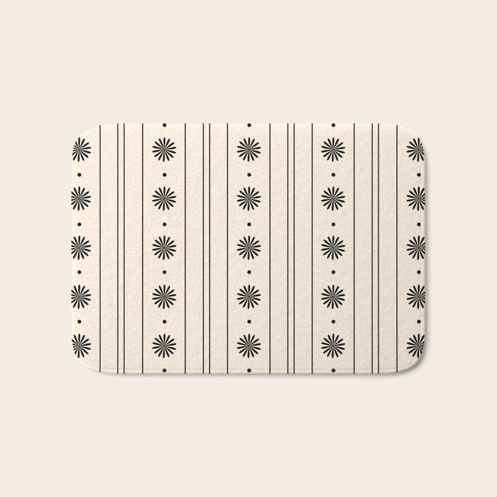Daisy Stripes Minimalist Geometric Flowers and Stripes Pattern in Black and Almond Cream Bath Mat Gallery Image 1