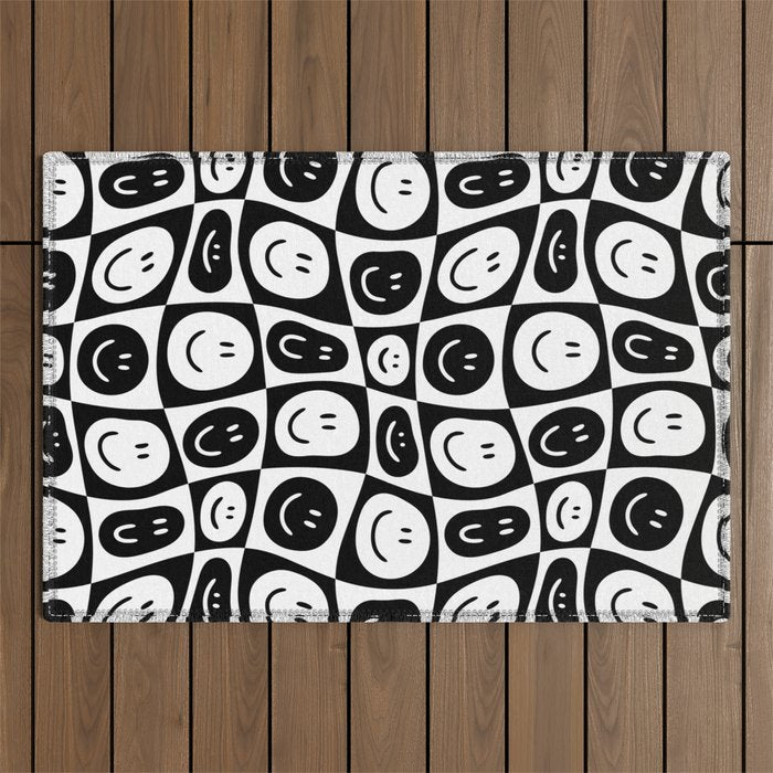 Black and white checkered happy face pattern Outdoor Rug Gallery Image 1