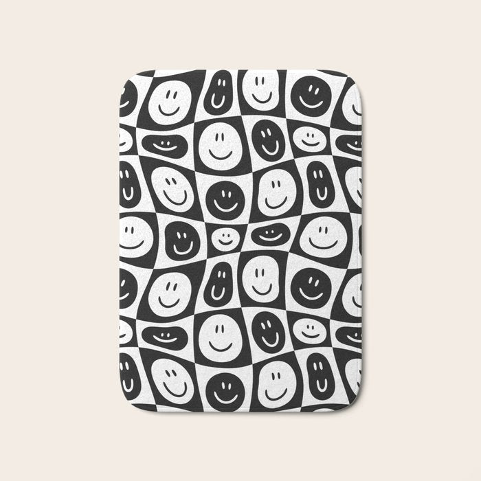 Black and white checkered happy face pattern Bath Mat Gallery Image 1