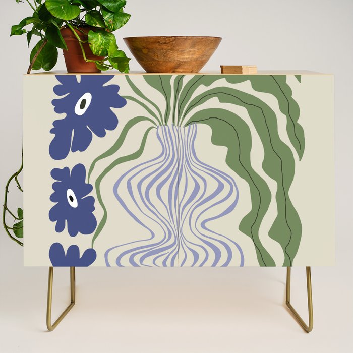 Dropping leaf plant  Credenza Gallery Image 1