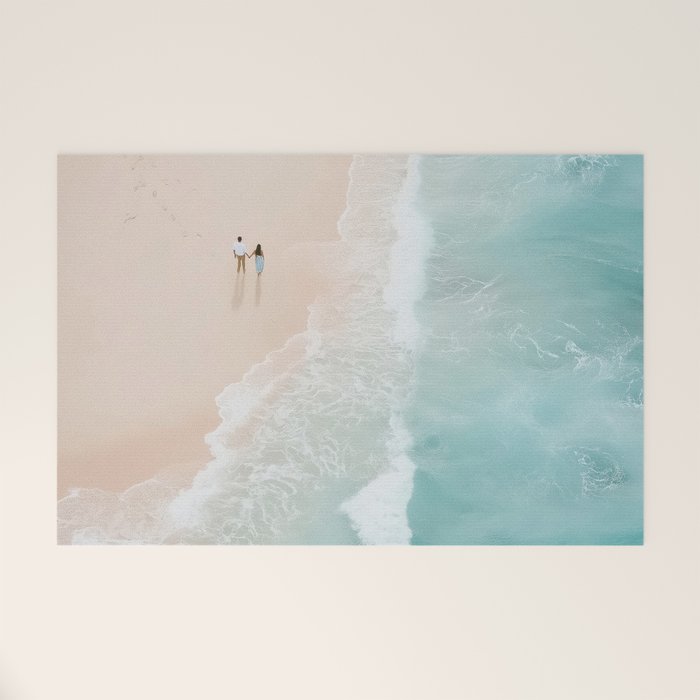 Couple on the Pastel Shore - Aerial Coastal Print Welcome Mat Gallery Image 1