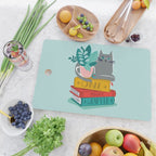 One more chapter // aqua background grey cat striped mug with plants red green and yellow books  Cutting Board Gallery Image 2