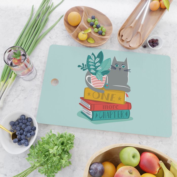 One more chapter // aqua background grey cat striped mug with plants red green and yellow books  Cutting Board Gallery Image 2
