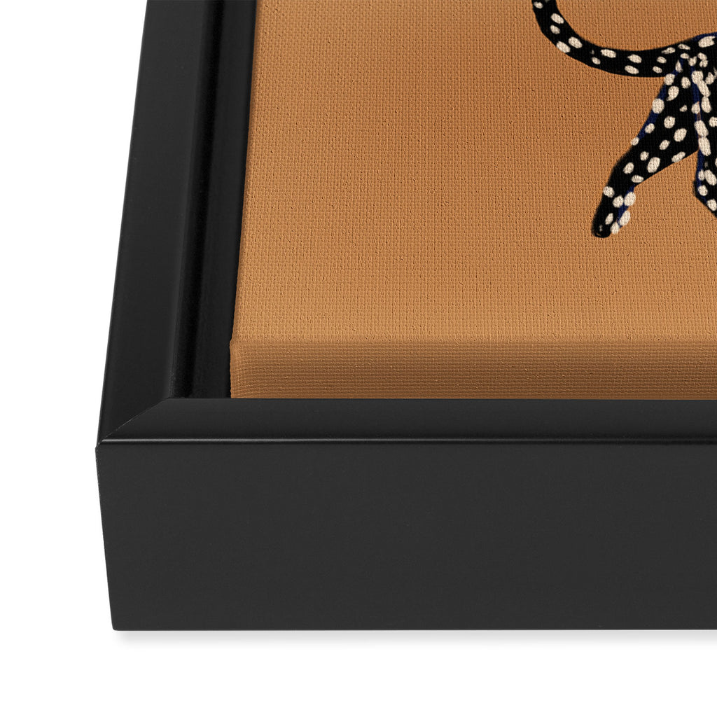 Black cheetah in sundial brown background  Framed Canvas Print Gallery Image 3