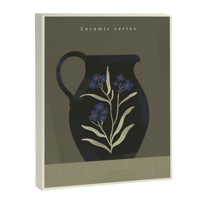 dark green ceramic jug with floral ornament on green background Canvas Print Gallery Image 1