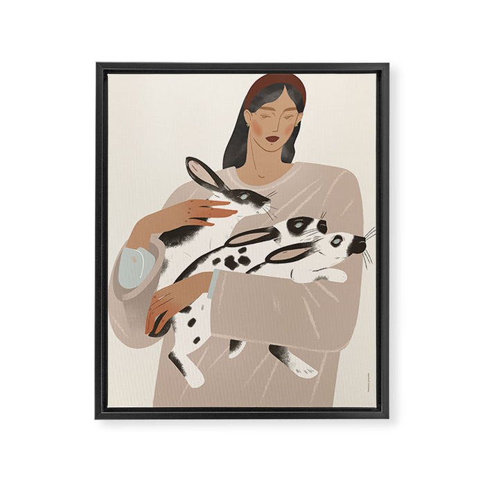 illustration of a girl with rabbits Framed Canvas Print Gallery Image 1
