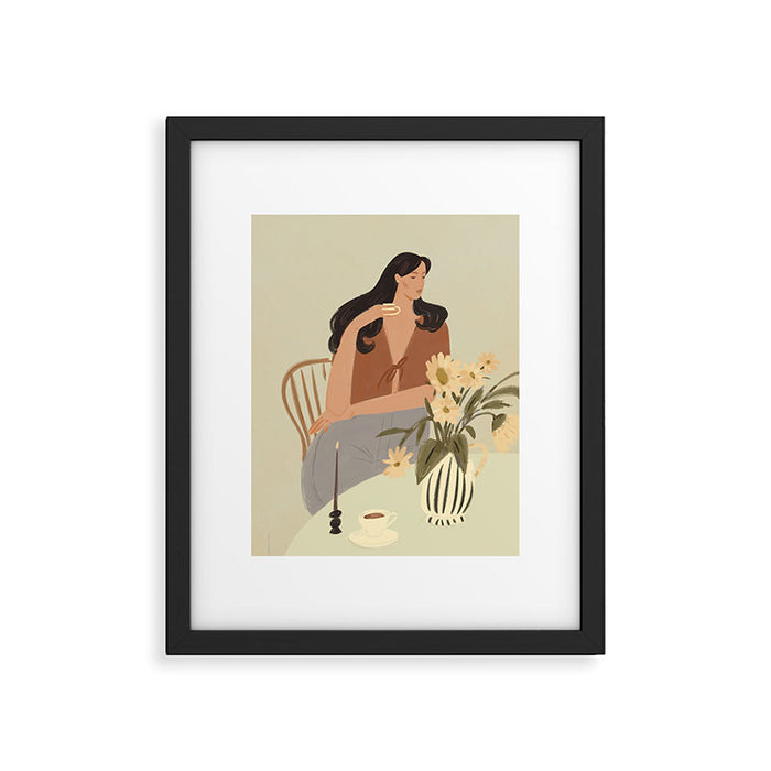 portrait of a fragile woman at a table with flowers Framed Art Print Gallery Image 1