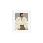  portrait of a fragile woman in a white embroidered shirt on a blue background Art Print Gallery Image 1