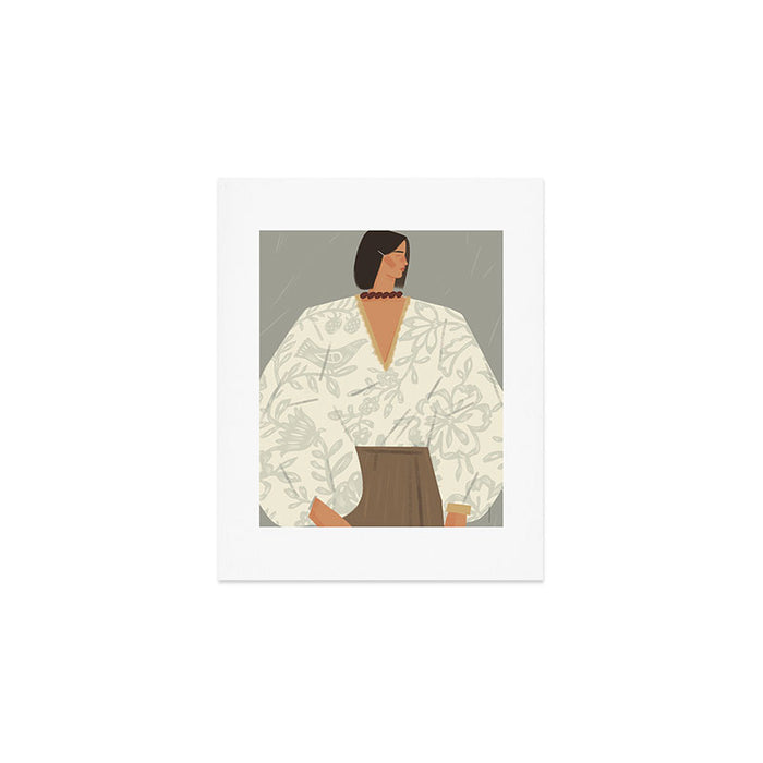  portrait of a fragile woman in a white embroidered shirt on a blue background Art Print Gallery Image 1