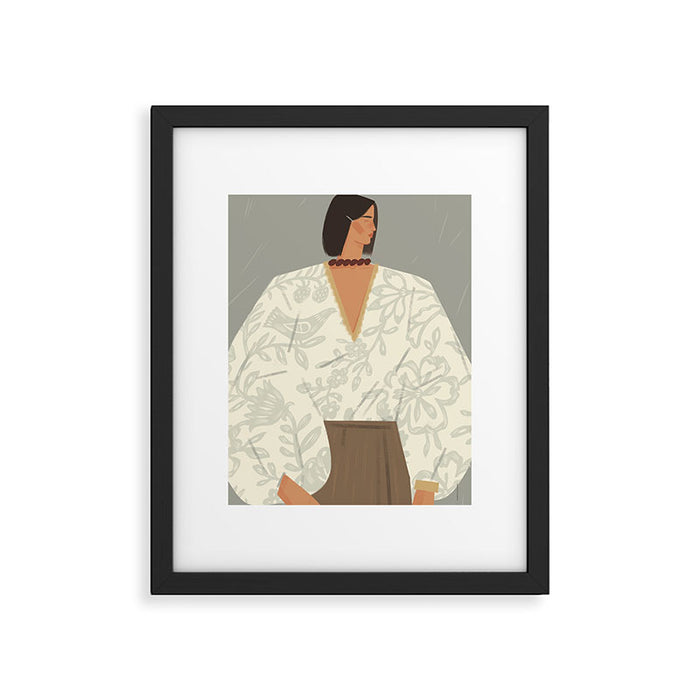 portrait of a fragile woman in a white embroidered shirt on a blue background Framed Art Print Gallery Image 1