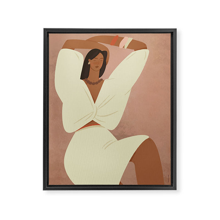  portrait of a fragile woman in a white suit on a pink background Framed Canvas Print Gallery Image 1