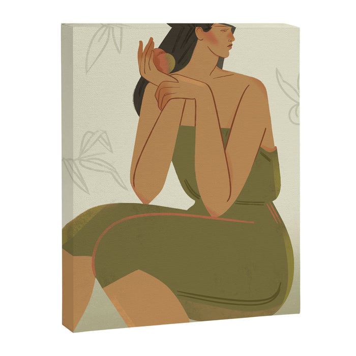 portrait of a girl with a peach in a green dress Canvas Print Gallery Image 1