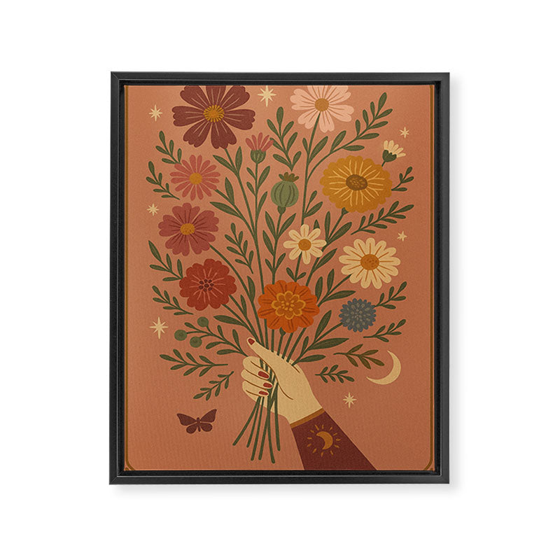 Folk Bouquet - Whimsical Hand Holding Wildflowers under Moon and Stars Framed Canvas Print Gallery Image 6