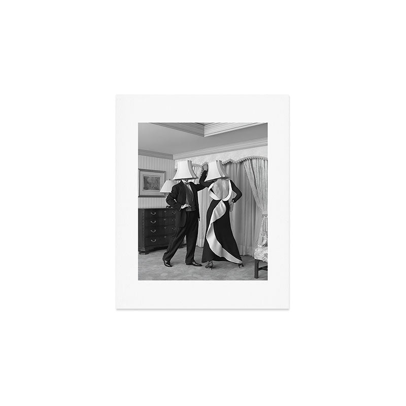 After party party animals; tipsy couple with lampshades on their heads funny humorous black and white vintage photograph - photograph - photographs Art Print Gallery Image 1