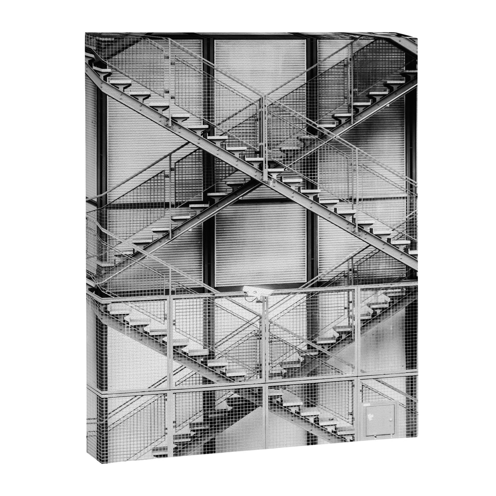 Escape from New York fire escape symmetrical steel staircase architecture black and white photograph Canvas Print Gallery Image 8