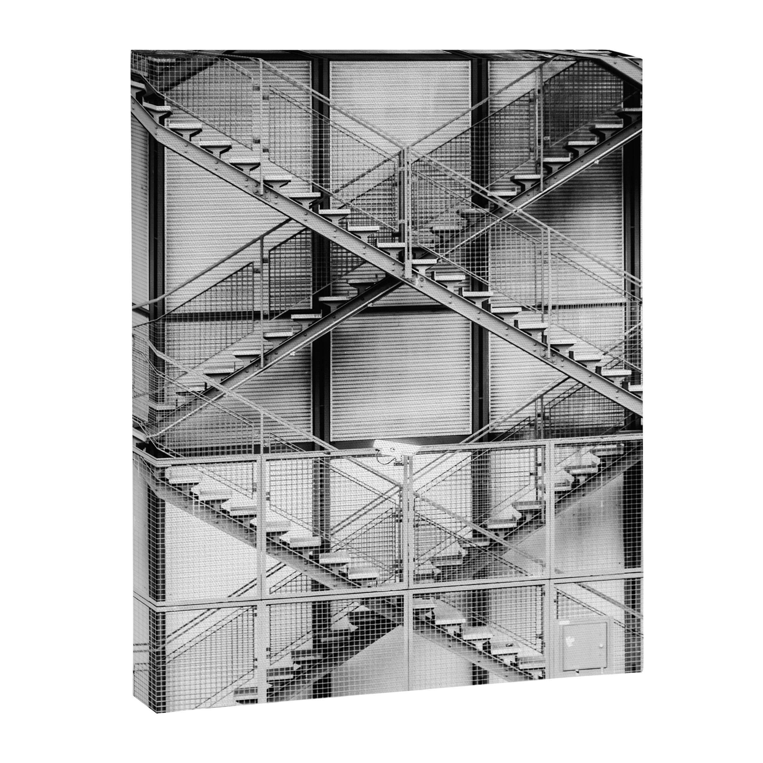 Escape from New York fire escape symmetrical steel staircase architecture black and white photograph Canvas Print Gallery Image 8