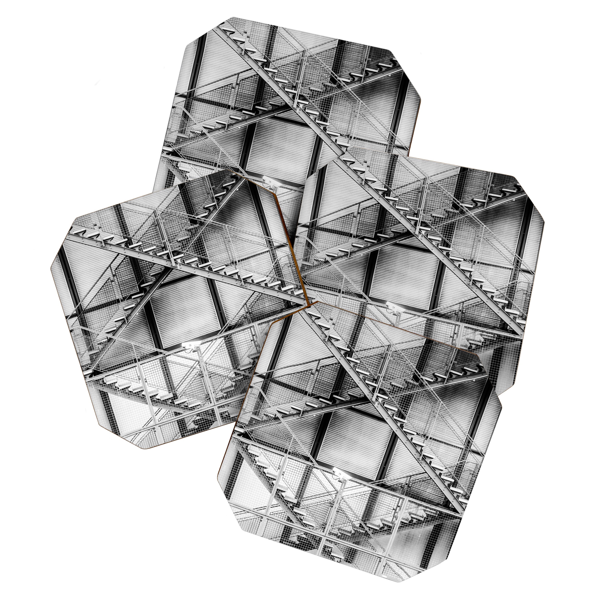 Escape from New York fire escape symmetrical steel staircase architecture black and white photograph Coaster Gallery Image 1
