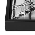 Escape from New York fire escape symmetrical steel staircase architecture black and white photograph Framed Canvas Print Gallery Image 3