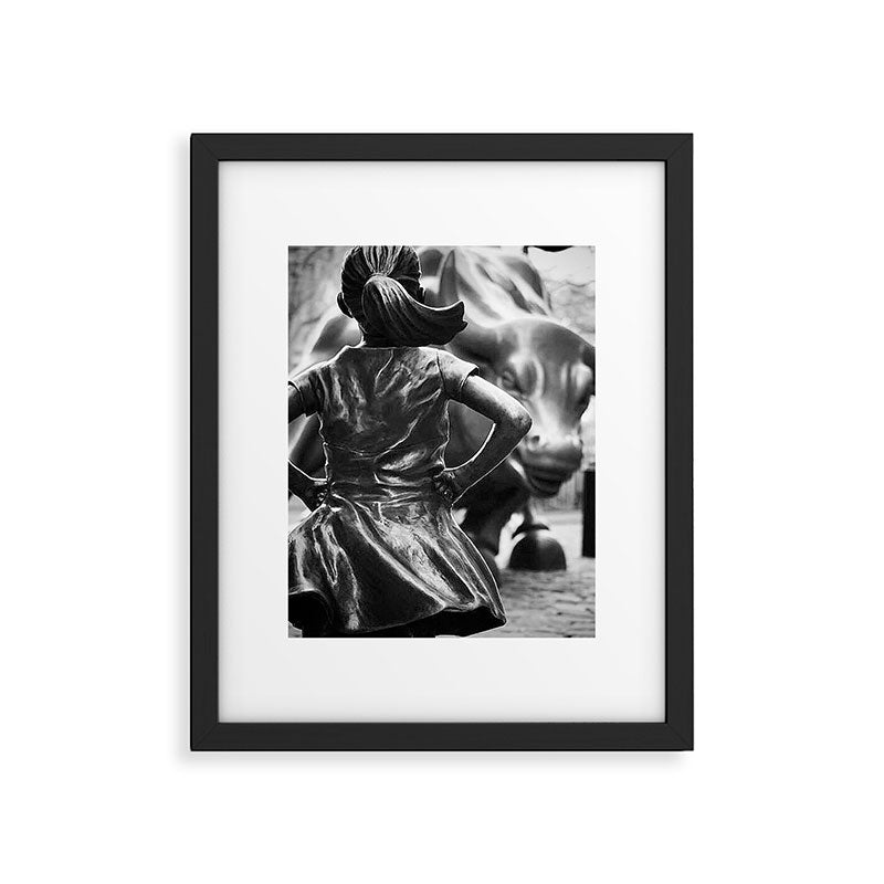 Fearless Girl facing down the Charging Bull statue of Wall Street black and white photography Framed Art Print Gallery Image 4