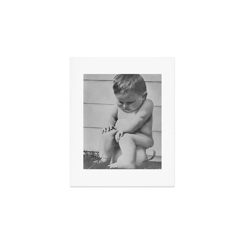 Giving all your effort - funny baby potty training on the pot black and white photograph  Art Print Gallery Image 1