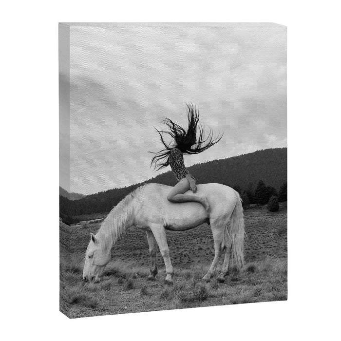 Wild horses couldn't take you from me; young woman on a white horse throwing her hair black wilderness black and white photograph - photography - photographs Canvas Print Gallery Image 1