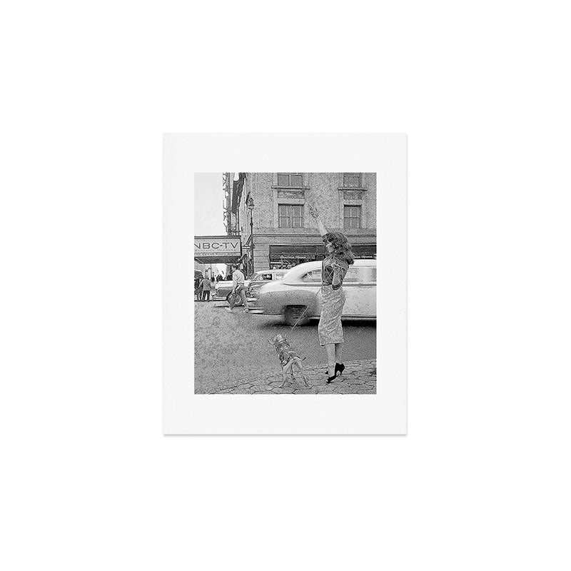 Young woman with pet dog hailing a yellow cab taxi New York City portrait black and white photograph - photography - photographs Art Print Gallery Image 1