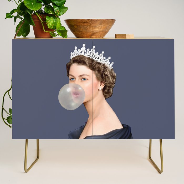 Queen Elizabeth in blue satin blowing a bubble gum Credenza Gallery Image 1
