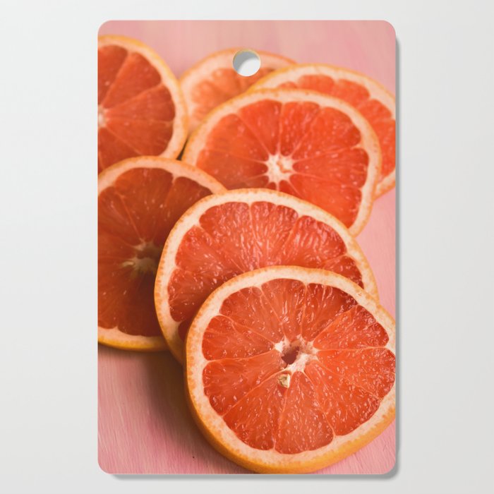 Grapefruit on Pink - still life floral photograph Cutting Board Gallery Image 1