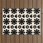 Scandi Floral Grid Retro Flower Pattern in Black and Almond Cream  Outdoor Rug Gallery Image 1