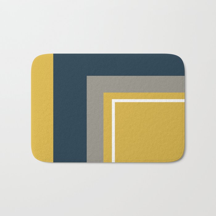 Half Frame Minimalist Pattern 3 in Deep Mustard Yellow, Navy Blue, Grey, and White. Bath Mat Gallery Image 1