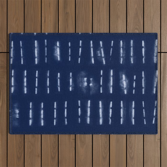 White stripes over blue shibori tie dye pattern Outdoor Rug Gallery Image 1
