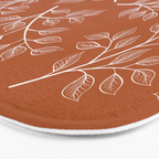 Delicate White Leaves and Branch on a Rust Orange Background Bath Mat Gallery Image 3