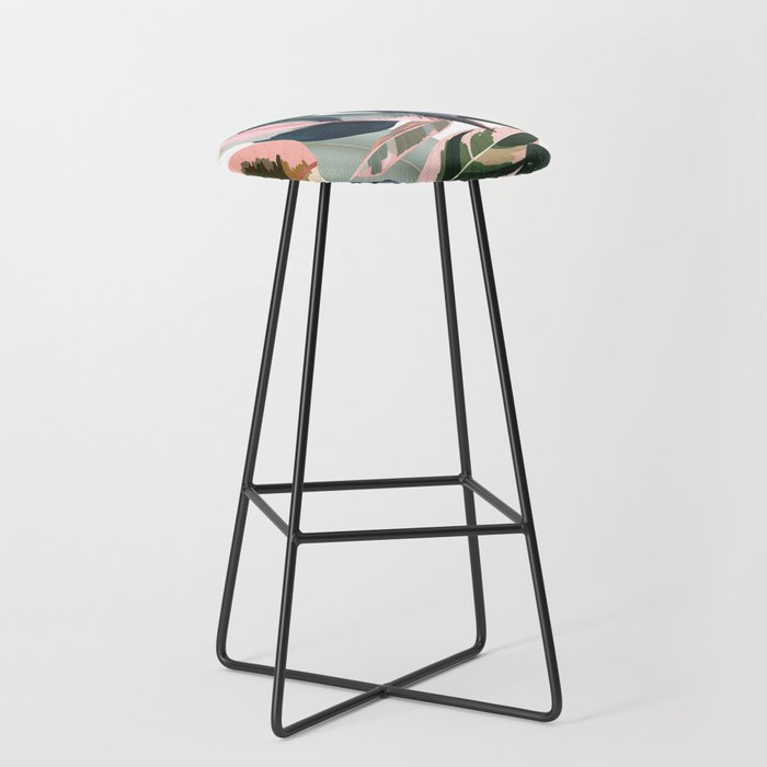 Colorful Tropical Palm Leaves on White Stool Gallery Image 1