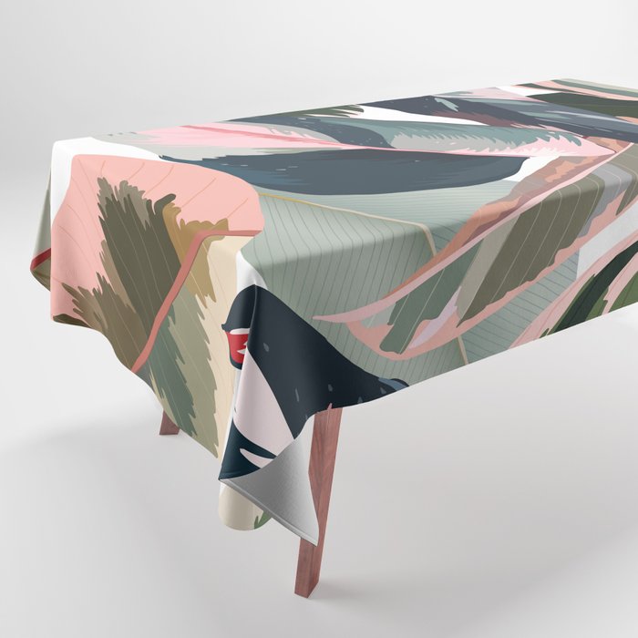 Colorful Tropical Palm Leaves on White Tablecloth Gallery Image 1