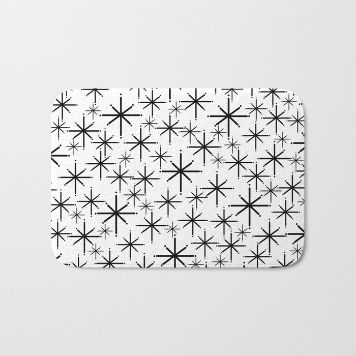 Mid Century Modern Twinkling Starburst Pattern in Black and White Bath Mat Gallery Image 1