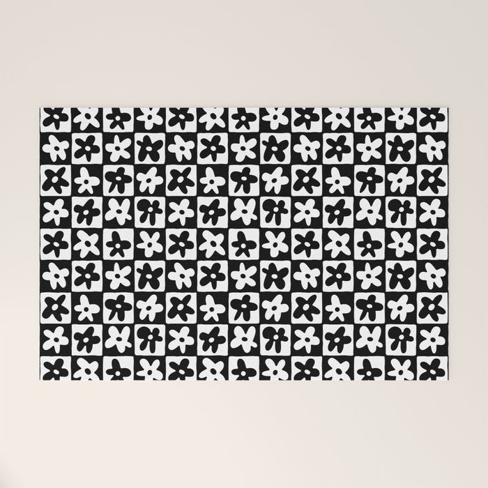 Black and white checkered floral pattern art Welcome Mat Gallery Image 1