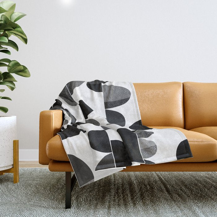 Mid Century Abstract cut-out Pebbles 3. Black and white Throw Blanket Gallery Image 1