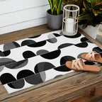 Mid Century Abstract cut-out Pebbles 3. Black and white Outdoor Rug Gallery Image 2