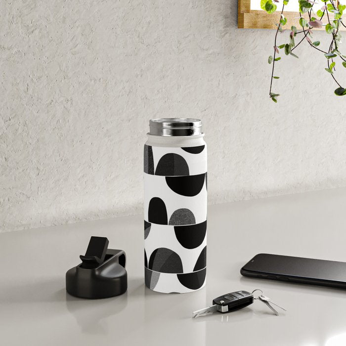 Mid Century Abstract cut-out Pebbles 3. Black and white Water Bottle Gallery Image 4
