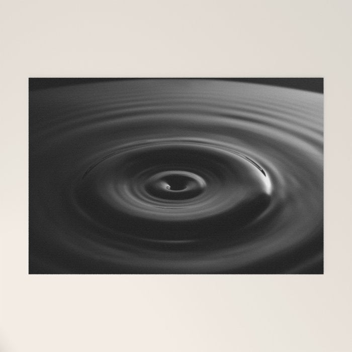 Zen water droplet in pool of water black and white inspirational photograph art print Welcome Mat Gallery Image 1