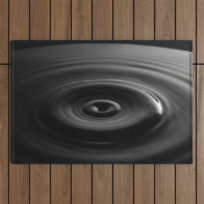 Zen water droplet in pool of water black and white inspirational photograph art print Outdoor Rug Gallery Image 1