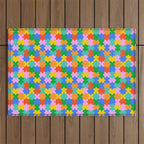 Fun colorful puzzle piece shape pattern Outdoor Rug Gallery Image 1