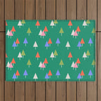 Minimalist Festive Trees on Green - Modern Holiday Pattern Outdoor Rug Gallery Image 1