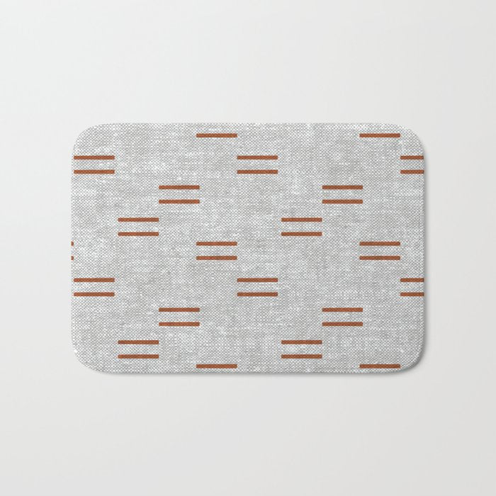 double dash - rust on greige Bath Mat Gallery Image 1